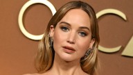 Jennifer Lawrence’s off-the-shoulder draped red carpet gown is the ultimate wedding dress for cool-girl brides