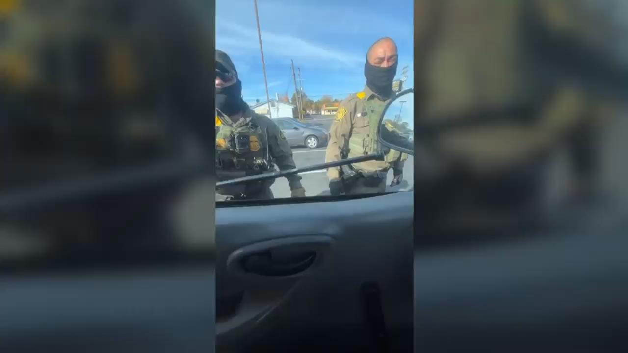 Man films car window being smashed by agents as immigration enforcement starts in Charlotte, NC