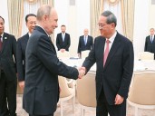 Putin says Russia-China ties are “experiencing best period in their history” during meeting with Li Qiang