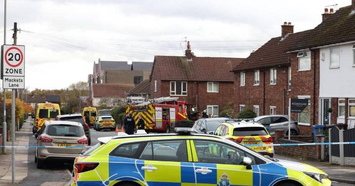 Armed police shutdown UK street as homes evacuated with emergency services on scene