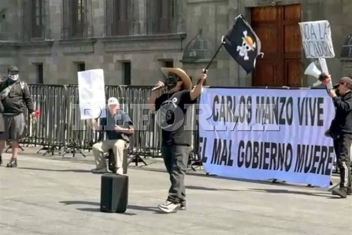 Protestan previo a presentación de Plan Michoacán