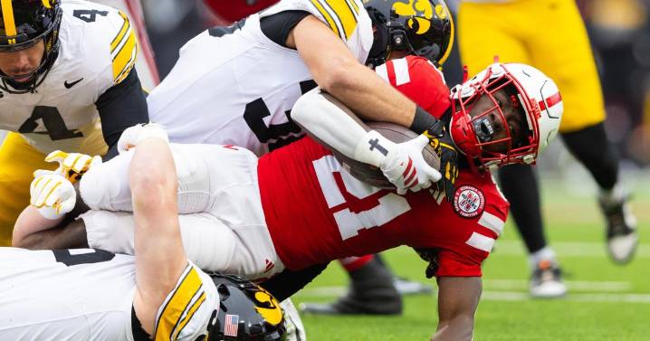 Iowa DT Aaron Graves with wife as son is born Thanksgiving, then he joins team for win at Nebraska
