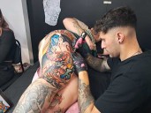 Tatuadores y tatuados en el Centro de Exposiciones y Congresos