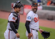 Twins trade for catcher, agree to terms for Justin Topa