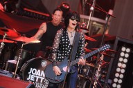 Rock legend Joan Jett appears on PETA billboard near Ann Arbor, urging Domino’s to go vegan