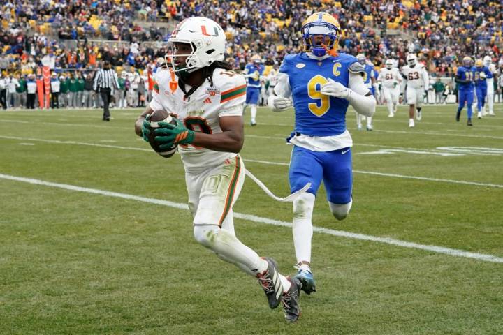 No. 13 Miami races past No. 24 Pitt 38-7 to state its case for a CFP berth