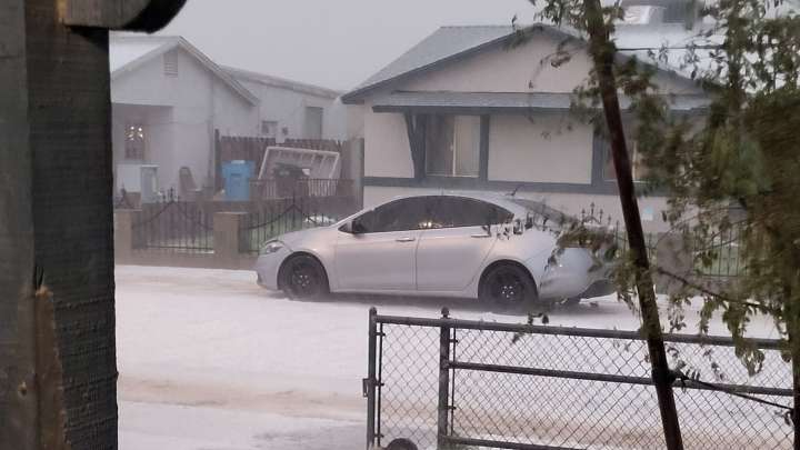 A cold, slow-moving storm brought hail, damaging winds to Phoenix