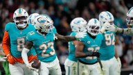 After offseason uncertainty, Jack Jones comes through again for Dolphins with key OT interception