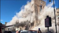 Rescuers in Rome struggle to reach worker trapped in medieval tower after partial collapse