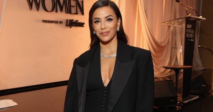 Eva Longoria Wows in Bold Neckline Dress