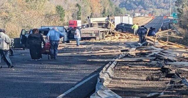 Portion of I-65 shut down after multi-vehicle wreck involving log truck in Morgan County