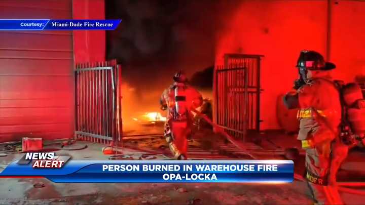 1 rushed to hospital after auto shop erupts in flames in Opa