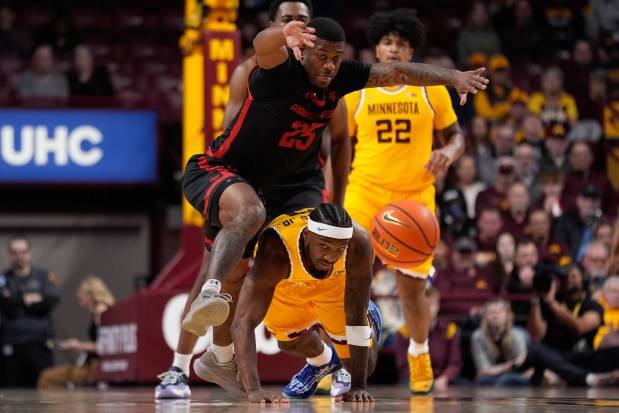 Men’s basketball: Gophers open with rout of Gardner