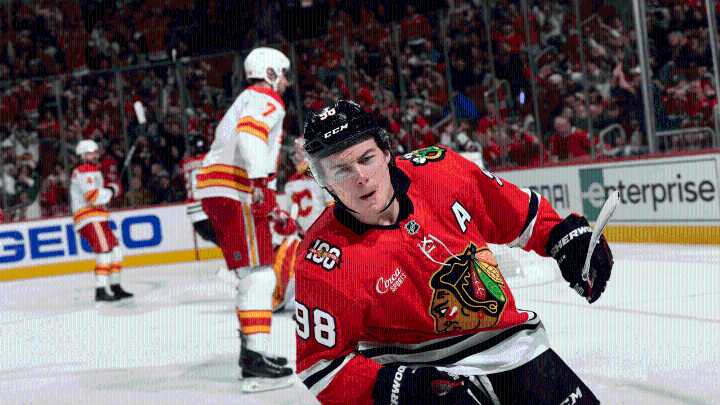 Bedard stays hot with hat trick, Blackhawks defeat Flames