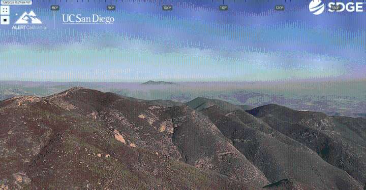 Firefighters battle border fire in steep and rocky terrain