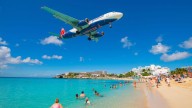 ‘It’s scary’: The Caribbean beach where planes zoom above your head