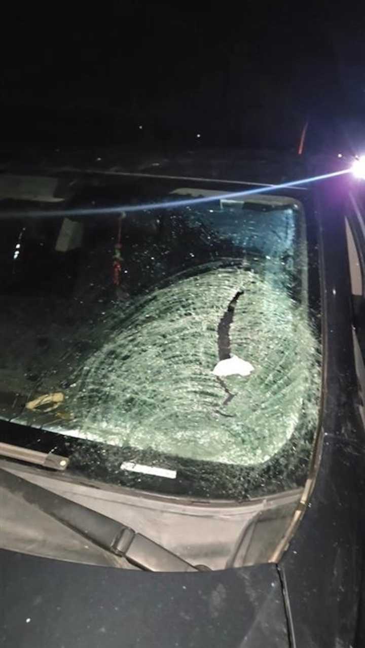 Frozen water balloon seriously injures man after plummeting through his windshield