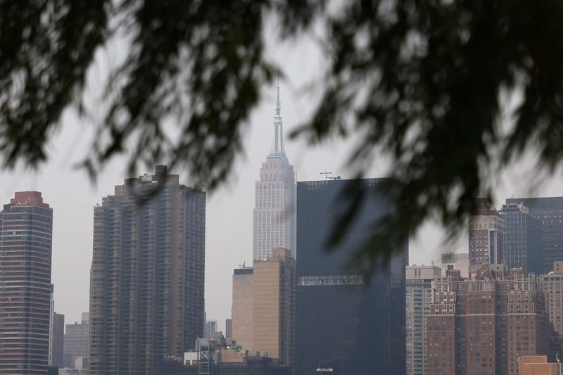 Loan demand from US mid- and large firms improves, Fed survey shows