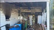 Officials work house fire in Morgan City on Wednesday morning