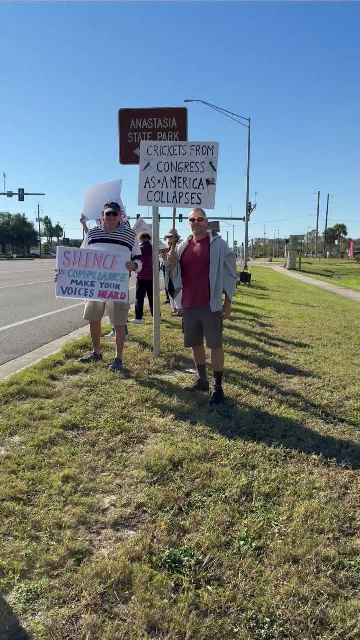 Protesters rally against ICE actions outside St. Augustine Home Depot