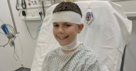 Hero boy, 11, hit in head by firework after throwing himself in way of baby sister