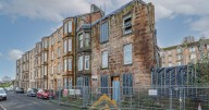 £5k three-bed Port Glasgow flat up for sale - but half the building is missing