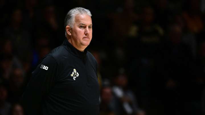 Purdue players soak Matt Painter to celebrate 500th career win. See it here