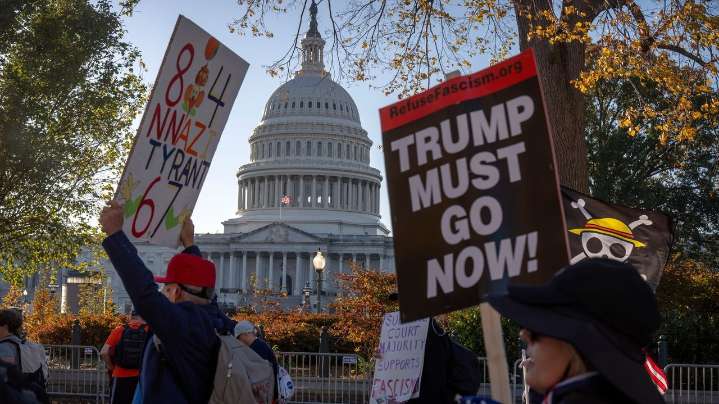 Democratic electoral wins re-energize protesters at an anti-Trump rally in nation's capital