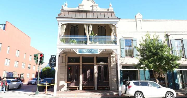 Penthouse condo above Peche in New Orleans’ Warehouse District is for sale. See inside.