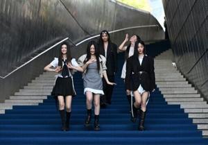 K-pop group NewJeans ends feud with record label ADOR