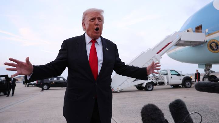 US President Donald Trump threatens BBC with legal action despite apology for 'error of judgement' over doctored speech