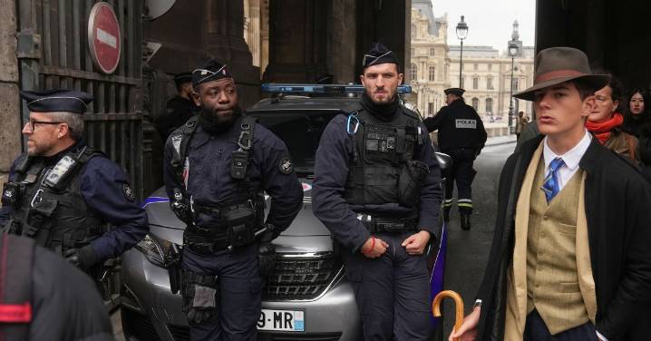 Mystery 'fedora man" at Louvre robbery scene unmasked