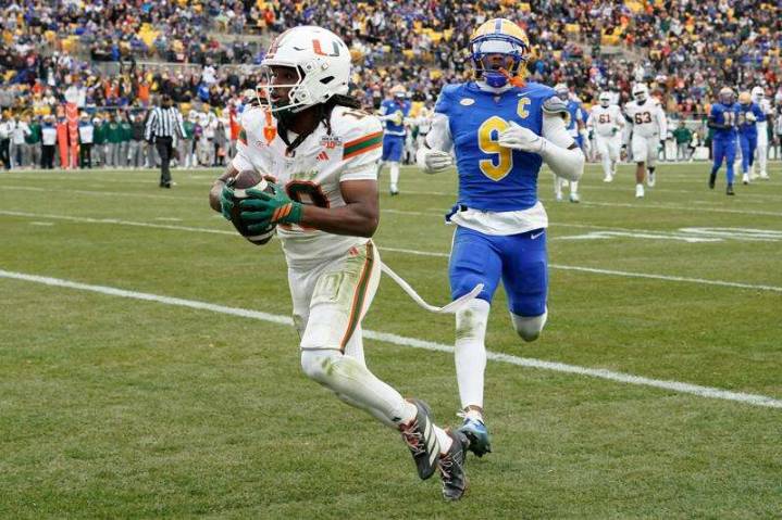 No. 13 Miami races past No. 24 Pitt 38-7 to state its case for a CFP berth