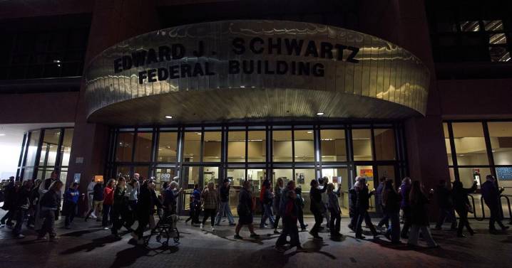 Lawsuit challenges arrests of people showing up to ICE check