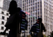 Asian markets make tepid gains as US shutdown set to end