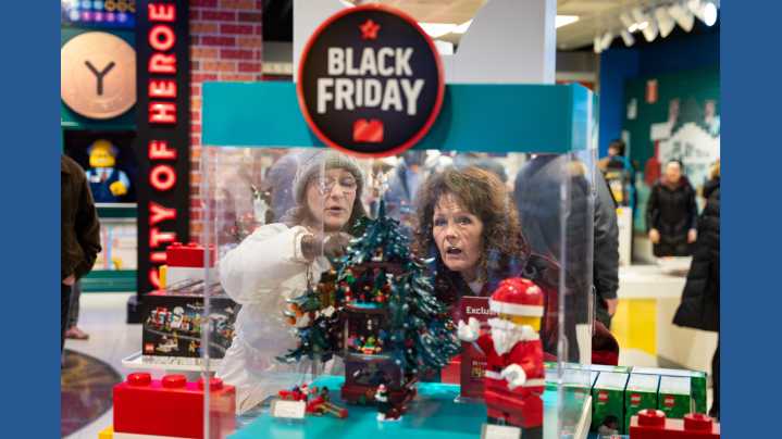 Shoppers hit Black Friday sales with celebratory mood despite economic strain