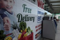 Trump threatens to withhold food aid as cities urge judicial intervention