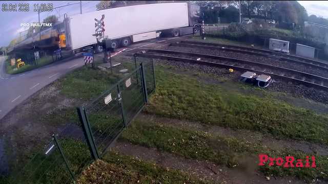 Video: Train plows into truck carrying thousands of pears