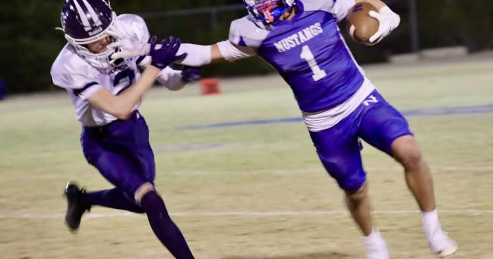 Needles football wins opening playoff game