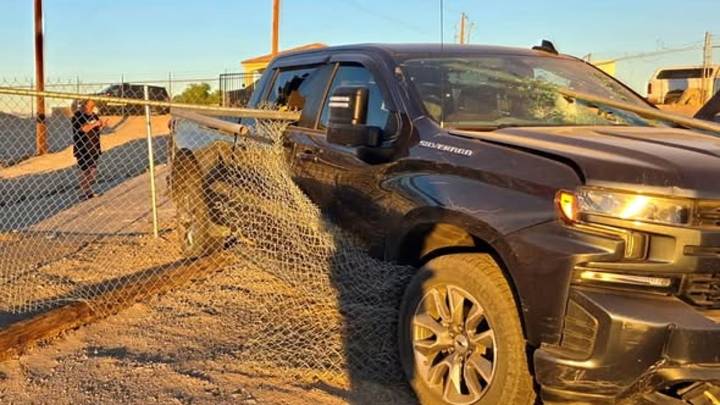 Driver dies after truck collides with fence