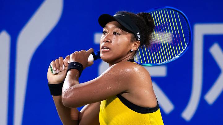 Naomi Osaka stuns in tiny backless mini dress and flower detail heels