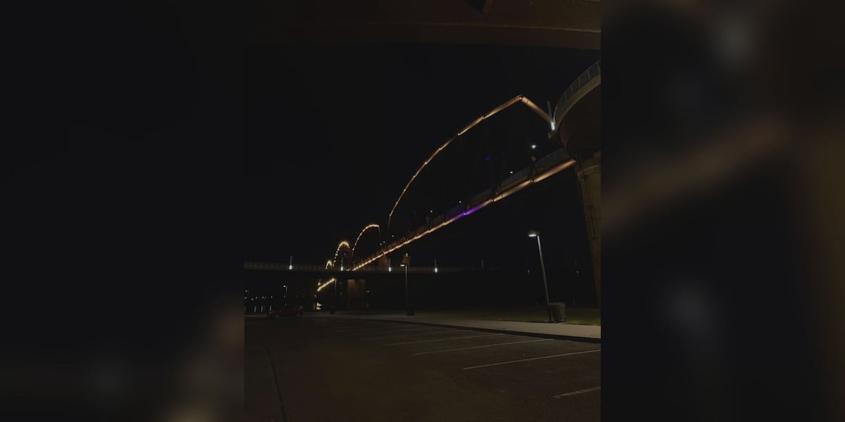 Big Four Bridge lit up yellow in honor of UPS plane crash