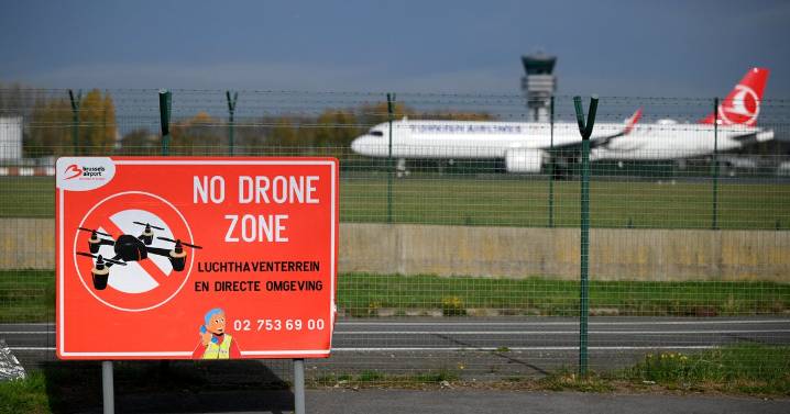 U.K. sends anti-drone troops to Belgium as airports shut down amid warnings of Russian "hybrid warfare"