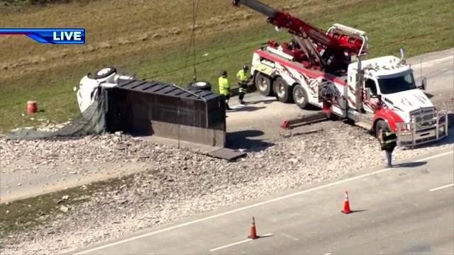 Truck overturns and spills debris, shutting down SB I-75 exit ramp at Pines Boulevard