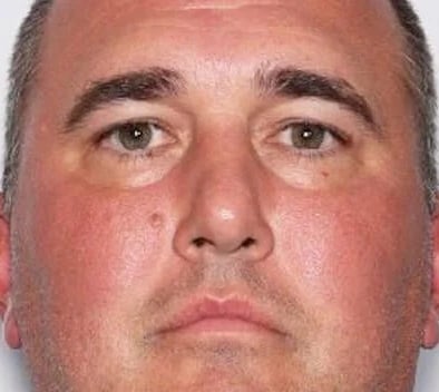 Missing Virginia high school football coach is wanted on child porn charges, police say