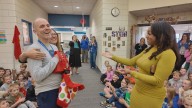 School fills hallways with students for PE Teacher of the Week who works with them all