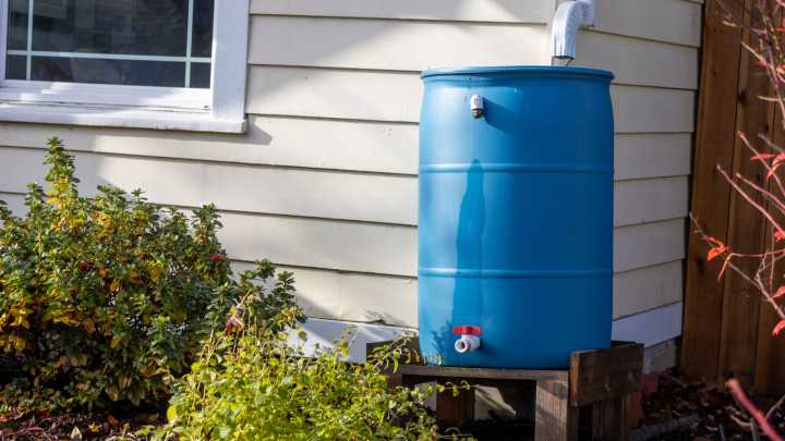 Ditch Industrial-Looking Rain Barrels For An Elegant Alternative With This Cool Diy