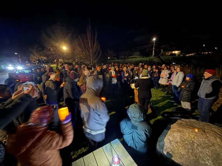 Supporters of Ali Faqirzada call for his release by candlelight