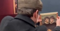 Pranksters outsmart Louvre security by sneaking fake painting next to Mona Lisa