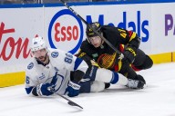 Deadspin | With 6-goal barrage, Canucks get rare road win vs. Lightning